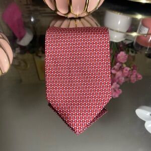Salvatore Ferragamo red colored all over printed print 100% silk tie